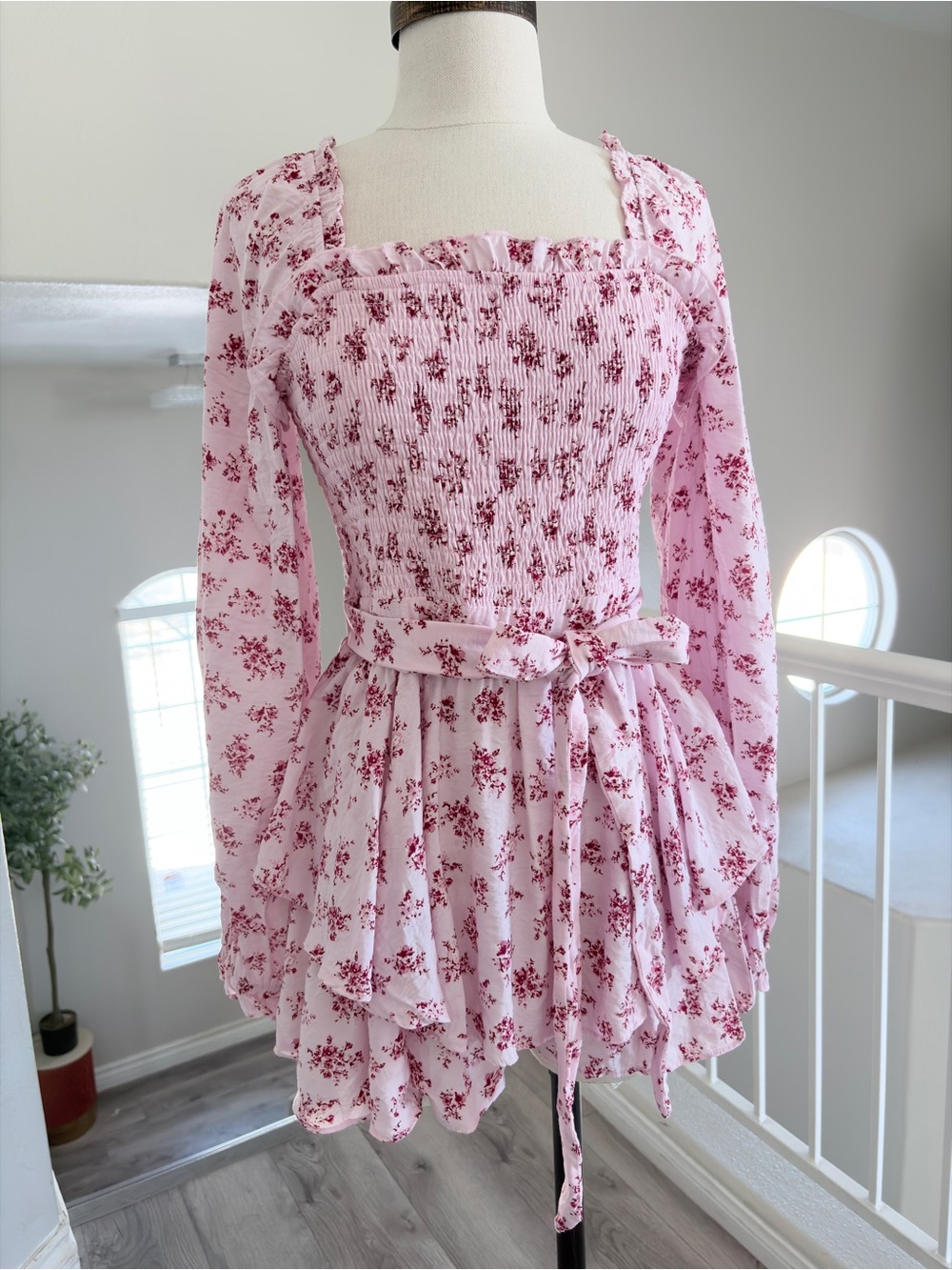 Francesca's Collections Pink Floral Smocked Romper with Tie Waist